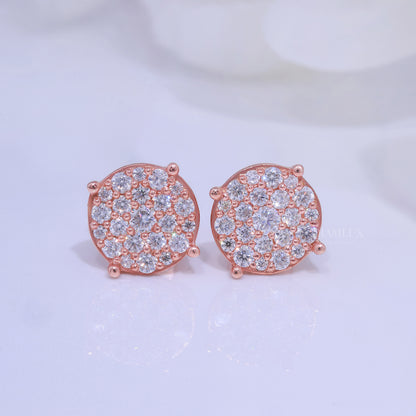 Close up of gold hoop earrings with small diamonds