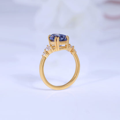 Yellow Gold Pear Shaped Dark Blue Gemstone Ring with Round Accent Stones Diamlux Fine Jewelry