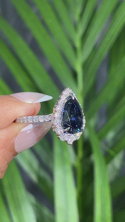 Pear Cut London Blue Topaz Halo Ring in 14K White Gold